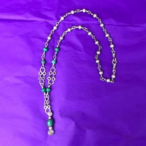 Silver necklace with green beads